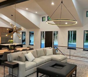 Jeremy Voigt Construction best custom home designer and general contractor in the Wausau open concept natural lighting living area with huge windows